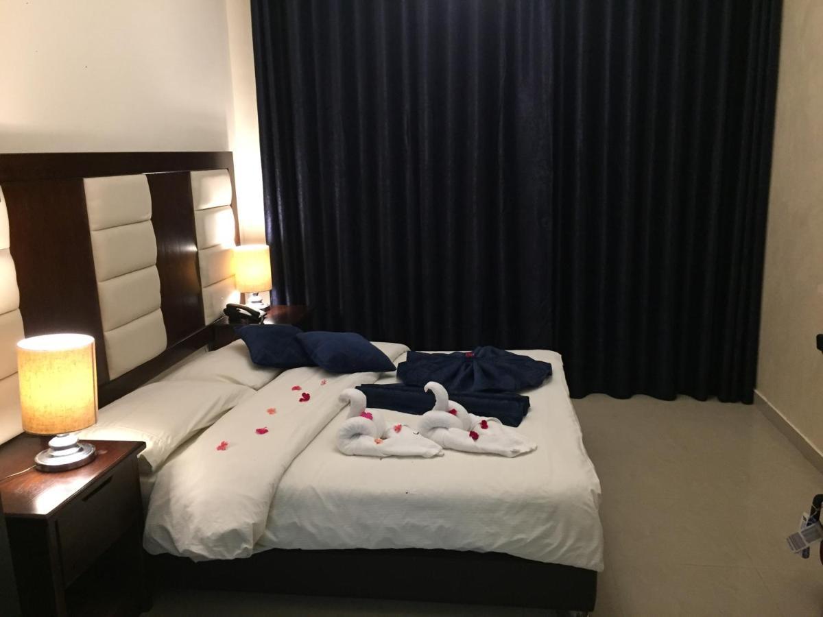 Uptown Hotel Apartment Амман Экстерьер фото